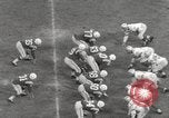 Image of Football game Baltimore Maryland USA, 1960, second 40 stock footage video 65675063696