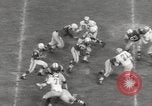 Image of Football game Baltimore Maryland USA, 1960, second 42 stock footage video 65675063696