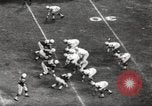 Image of Football game Baltimore Maryland USA, 1960, second 57 stock footage video 65675063696