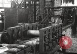 Image of Forging saw blades at Disston Saw works factory Philadelphia Pennsvlvania USA, 1920, second 25 stock footage video 65675063729