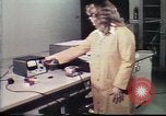 Image of Federal Bureau of Investigation footprint analysis Washington DC USA, 1977, second 26 stock footage video 65675063775
