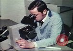 Image of Federal Bureau of Investigation footprint analysis Washington DC USA, 1977, second 47 stock footage video 65675063775