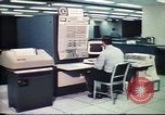 Image of Federal Bureau of Investigation fingerprint analysis Washington DC USA, 1977, second 15 stock footage video 65675063776
