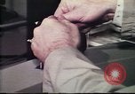 Image of Federal Bureau of Investigation fingerprint analysis Washington DC USA, 1977, second 52 stock footage video 65675063776