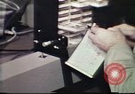 Image of Federal Bureau of Investigation fingerprint analysis Washington DC USA, 1977, second 57 stock footage video 65675063776