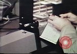 Image of Federal Bureau of Investigation fingerprint analysis Washington DC USA, 1977, second 58 stock footage video 65675063776