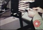 Image of Federal Bureau of Investigation fingerprint analysis Washington DC USA, 1977, second 59 stock footage video 65675063776