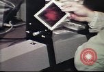 Image of Federal Bureau of Investigation fingerprint analysis Washington DC USA, 1977, second 61 stock footage video 65675063776
