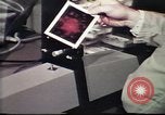 Image of Federal Bureau of Investigation fingerprint analysis Washington DC USA, 1977, second 62 stock footage video 65675063776