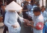 Image of Vietnamese people Saigon Vietnam, 1969, second 48 stock footage video 65675063785