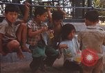 Image of Vietnamese children Saigon Vietnam, 1969, second 51 stock footage video 65675063789