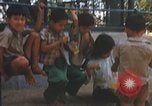 Image of Vietnamese children Saigon Vietnam, 1969, second 52 stock footage video 65675063789