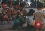 Image of Vietnamese children Saigon Vietnam, 1969, second 53 stock footage video 65675063789