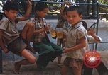 Image of Vietnamese children Saigon Vietnam, 1969, second 61 stock footage video 65675063789