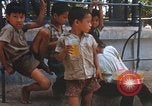 Image of Vietnamese children Saigon Vietnam, 1969, second 62 stock footage video 65675063789
