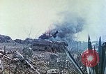 Standbild japanische Artillerie feuert auf US-Tanks Iwo Jima, 1945, aus Sekunde 26 historischem Filmmaterial Videoclip 65675063846