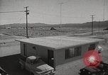 Image of Operation Cue effects on house and telephone poles Nevada United States USA, 1955, second 3 stock footage video 65675063885