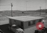 Image of Operation Cue effects on house and telephone poles Nevada United States USA, 1955, second 4 stock footage video 65675063885