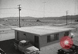 Image of Operation Cue effects on house and telephone poles Nevada United States USA, 1955, second 7 stock footage video 65675063885