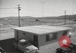 Image of Operation Cue effects on house and telephone poles Nevada United States USA, 1955, second 9 stock footage video 65675063885