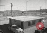 Image of Operation Cue effects on house and telephone poles Nevada United States USA, 1955, second 10 stock footage video 65675063885