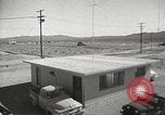 Image of Operation Cue effects on house and telephone poles Nevada United States USA, 1955, second 11 stock footage video 65675063885