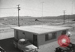 Image of Operation Cue effects on house and telephone poles Nevada United States USA, 1955, second 12 stock footage video 65675063885