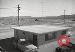Image of Operation Cue effects on house and telephone poles Nevada United States USA, 1955, second 13 stock footage video 65675063885