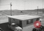 Image of Operation Cue effects on house and telephone poles Nevada United States USA, 1955, second 14 stock footage video 65675063885