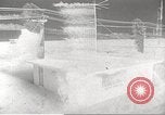 Image of Operation Cue effects on house and telephone poles Nevada United States USA, 1955, second 22 stock footage video 65675063885