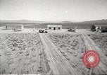 Image of House and cars in Operation Cue nuclear test Nevada United States USA, 1955, second 5 stock footage video 65675063891