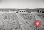 Image of House and cars in Operation Cue nuclear test Nevada United States USA, 1955, second 8 stock footage video 65675063891