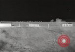 Image of House and cars in Operation Cue nuclear test Nevada United States USA, 1955, second 26 stock footage video 65675063891