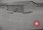 Image of Operation Cue tin roof house in blast Nevada United States USA, 1955, second 3 stock footage video 65675063892