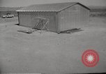 Image of Operation Cue tin roof house in blast Nevada United States USA, 1955, second 4 stock footage video 65675063892