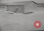 Image of Operation Cue tin roof house in blast Nevada United States USA, 1955, second 13 stock footage video 65675063892