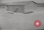 Image of Operation Cue tin roof house in blast Nevada United States USA, 1955, second 15 stock footage video 65675063892