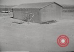 Image of Operation Cue tin roof house in blast Nevada United States USA, 1955, second 16 stock footage video 65675063892
