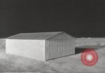 Image of Operation Cue tin roof house in blast Nevada United States USA, 1955, second 30 stock footage video 65675063892