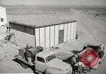 Image of Operation Cue nuclear testing staff and test house  Nevada United States USA, 1955, second 1 stock footage video 65675063895