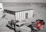 Image of Operation Cue nuclear testing staff and test house  Nevada United States USA, 1955, second 3 stock footage video 65675063895