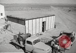 Image of Operation Cue nuclear testing staff and test house  Nevada United States USA, 1955, second 5 stock footage video 65675063895