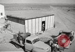Image of Operation Cue nuclear testing staff and test house  Nevada United States USA, 1955, second 6 stock footage video 65675063895