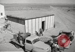 Image of Operation Cue nuclear testing staff and test house  Nevada United States USA, 1955, second 9 stock footage video 65675063895