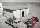 Image of Operation Cue nuclear testing staff and test house  Nevada United States USA, 1955, second 12 stock footage video 65675063895