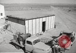 Image of Operation Cue nuclear testing staff and test house  Nevada United States USA, 1955, second 14 stock footage video 65675063895