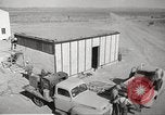 Image of Operation Cue nuclear testing staff and test house  Nevada United States USA, 1955, second 15 stock footage video 65675063895