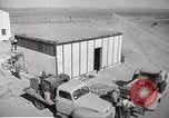Image of Operation Cue nuclear testing staff and test house  Nevada United States USA, 1955, second 17 stock footage video 65675063895