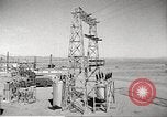 Image of Operation Cue electrical transmission tower in blast Nevada United States USA, 1955, second 12 stock footage video 65675063897
