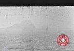 Image of US Warships fire guns at Corregidor Philippines, 1945, second 1 stock footage video 65675063916